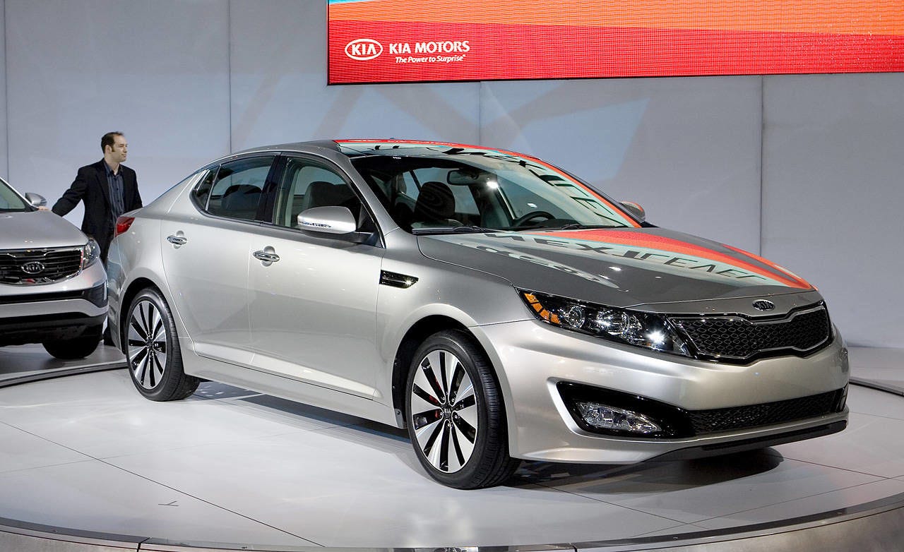 kia optima 2011 5 passenger front wheel drive sedanduring the unveiling of the 2011 kia optima it was difficult not to think of the new hyundai sonata on level 3 of the new york auto show